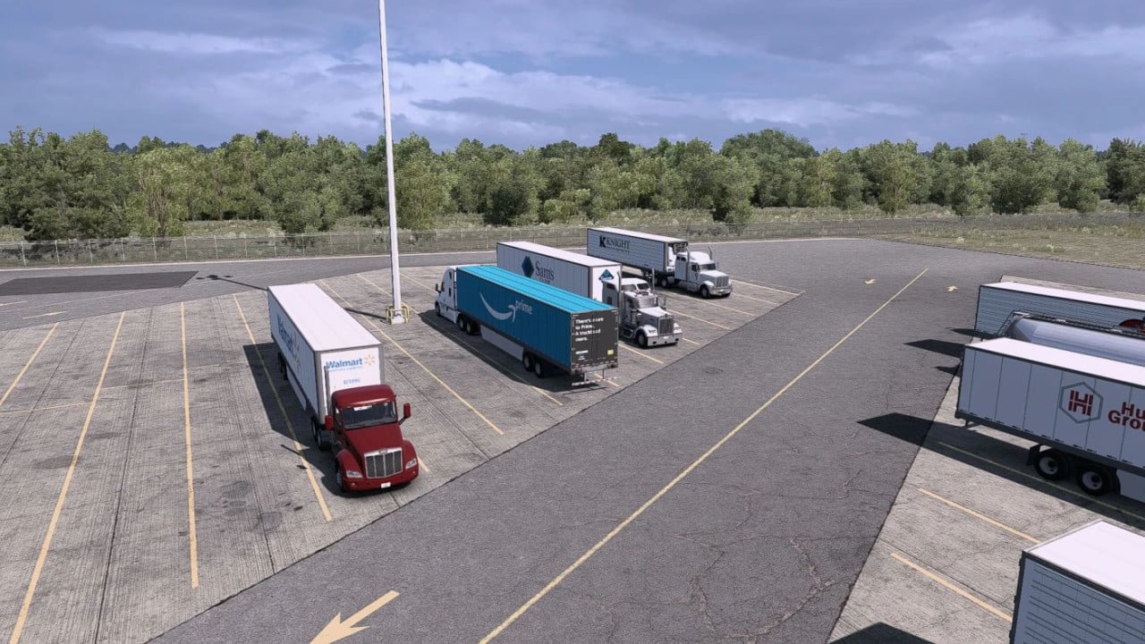 More various parked trucks & trailers